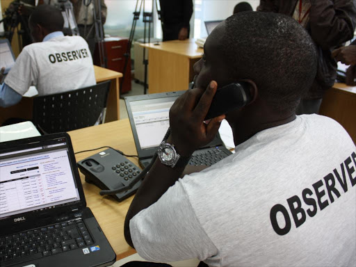 Election Observer Group officials during a past poll. /FILE