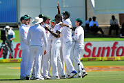 Proteas celebrate Kagiso Rabada 's 10th wicket of the match during day four of the second 2018 Sunfoil Test match between South Africa and Australia at St George's Park, Port Elizabeth on 12 March 2018.