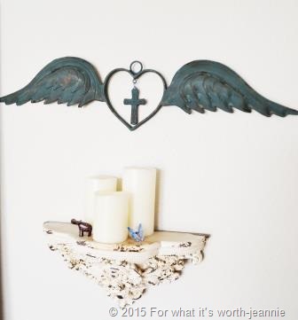 [wings-and-candles-on-wall2.jpg]