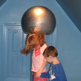 Hannah and Bryan getting staticky hair at the Magic House in St Louis 03202011a