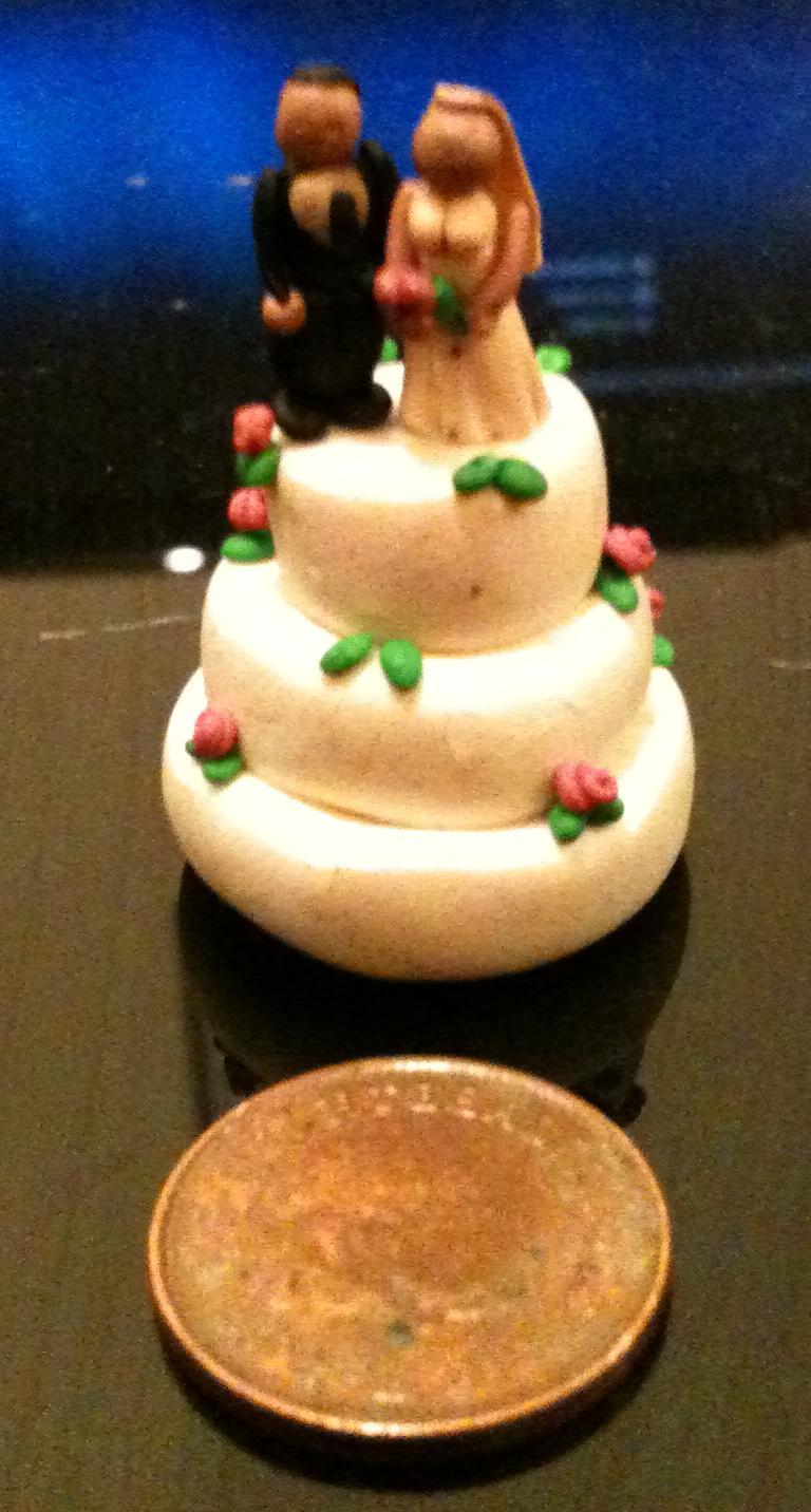 Miniature wedding cake by  sheriffbrody on deviantART