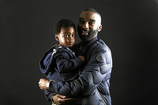 Rapper Riky Rick with his son Maik.