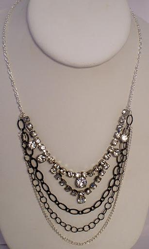 silver and gunmetal chain,