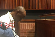 Donald Sebolai sits in the public gallery at the Johannesburg High Court, sitting in Palm Ridge. File photo.