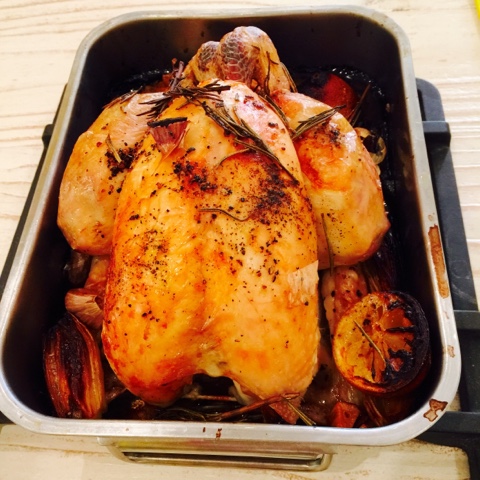 Roast chicken with vegetables and lemon