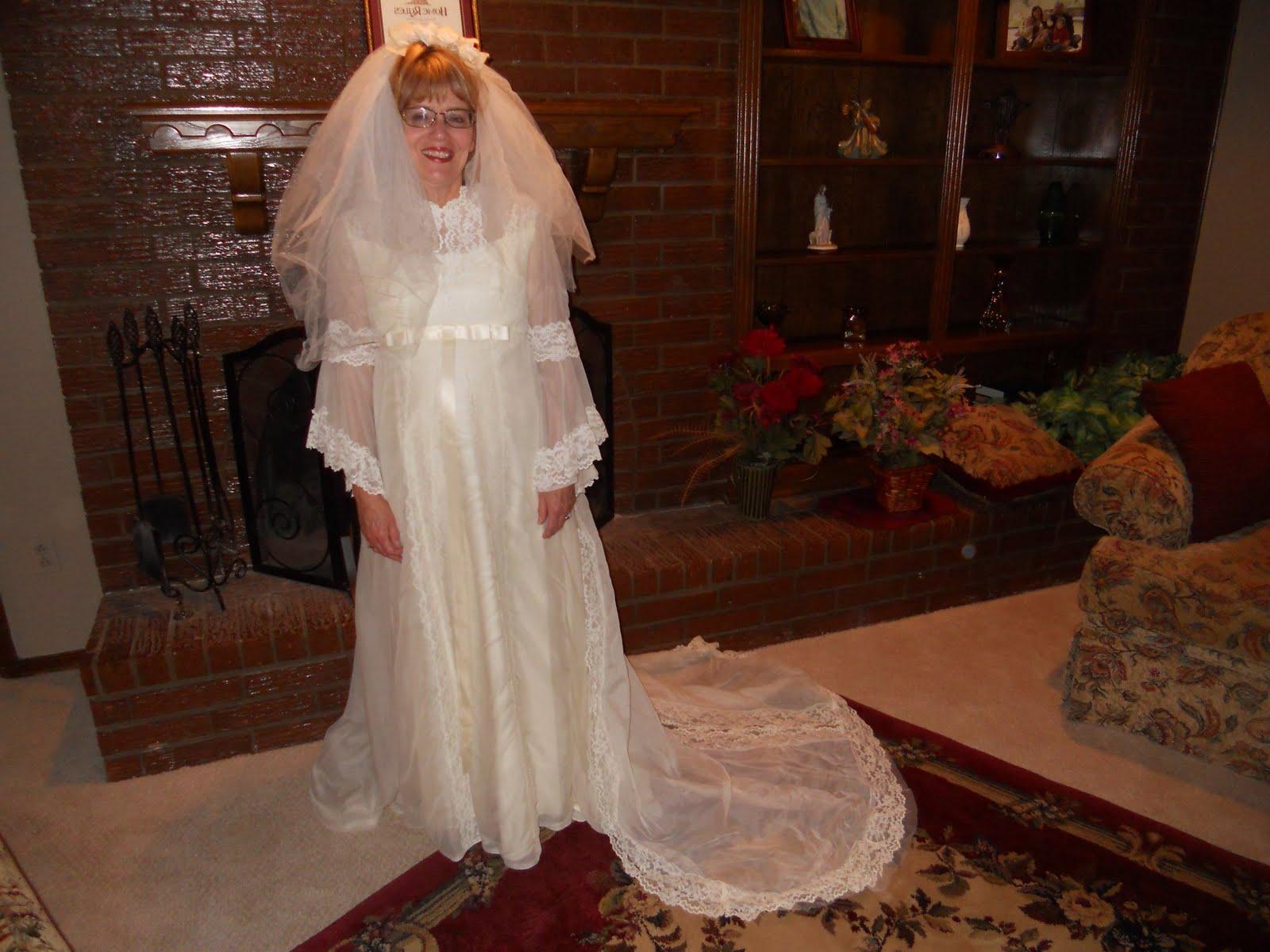 she in her wedding dress?