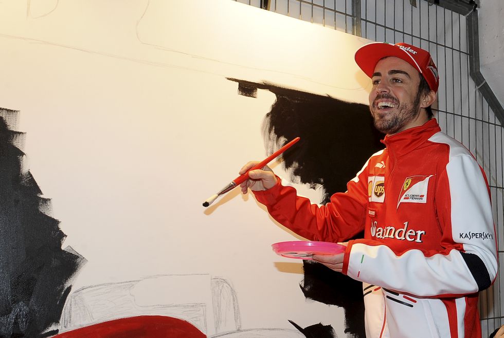 Фернандо Алонсо разукрашивает болид Ferrari на спонсорском мероприятии Santander - март 2013