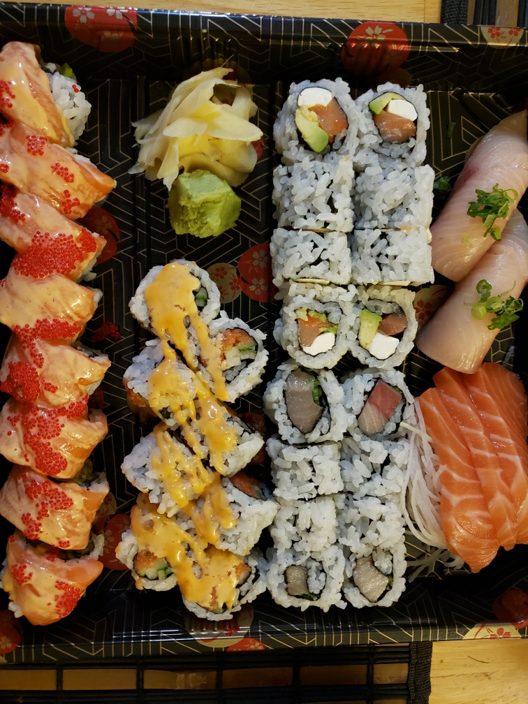 Red Eye roll (specialty) on the left, plus Maki, sashimi, nigiri.