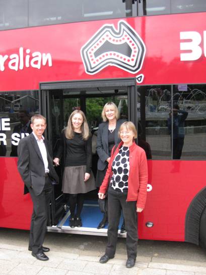 greens on a red bus