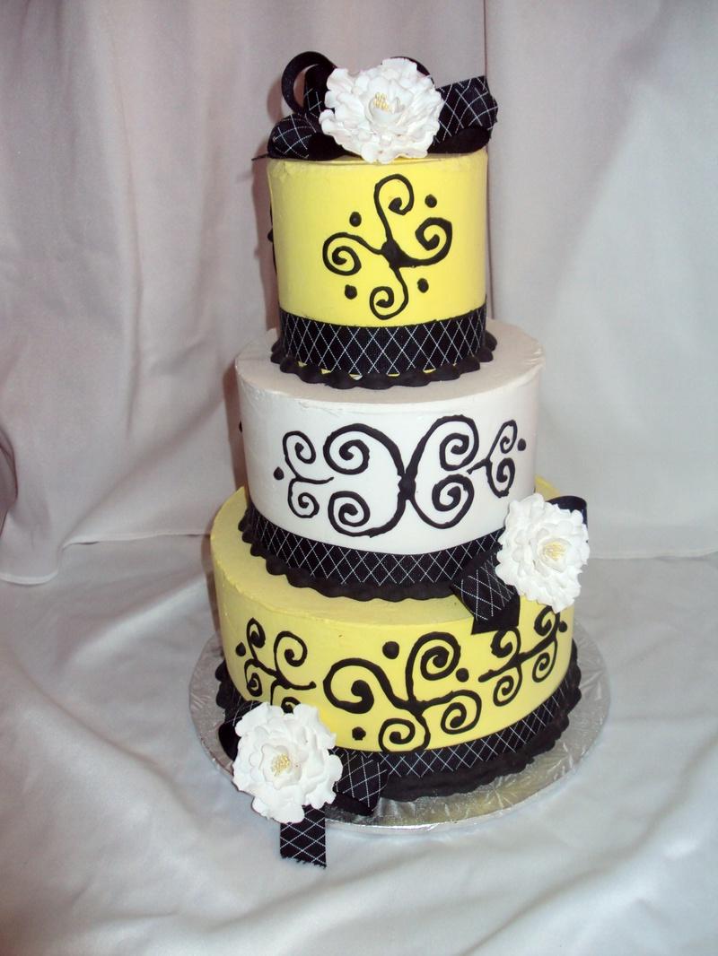 Yellow, Black, and White Cake