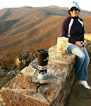 Fialka Grigorova at the top of Hawksbill Mountain, Shenandoah National Park in Virginia.  In front is a pot of coffee brewing.