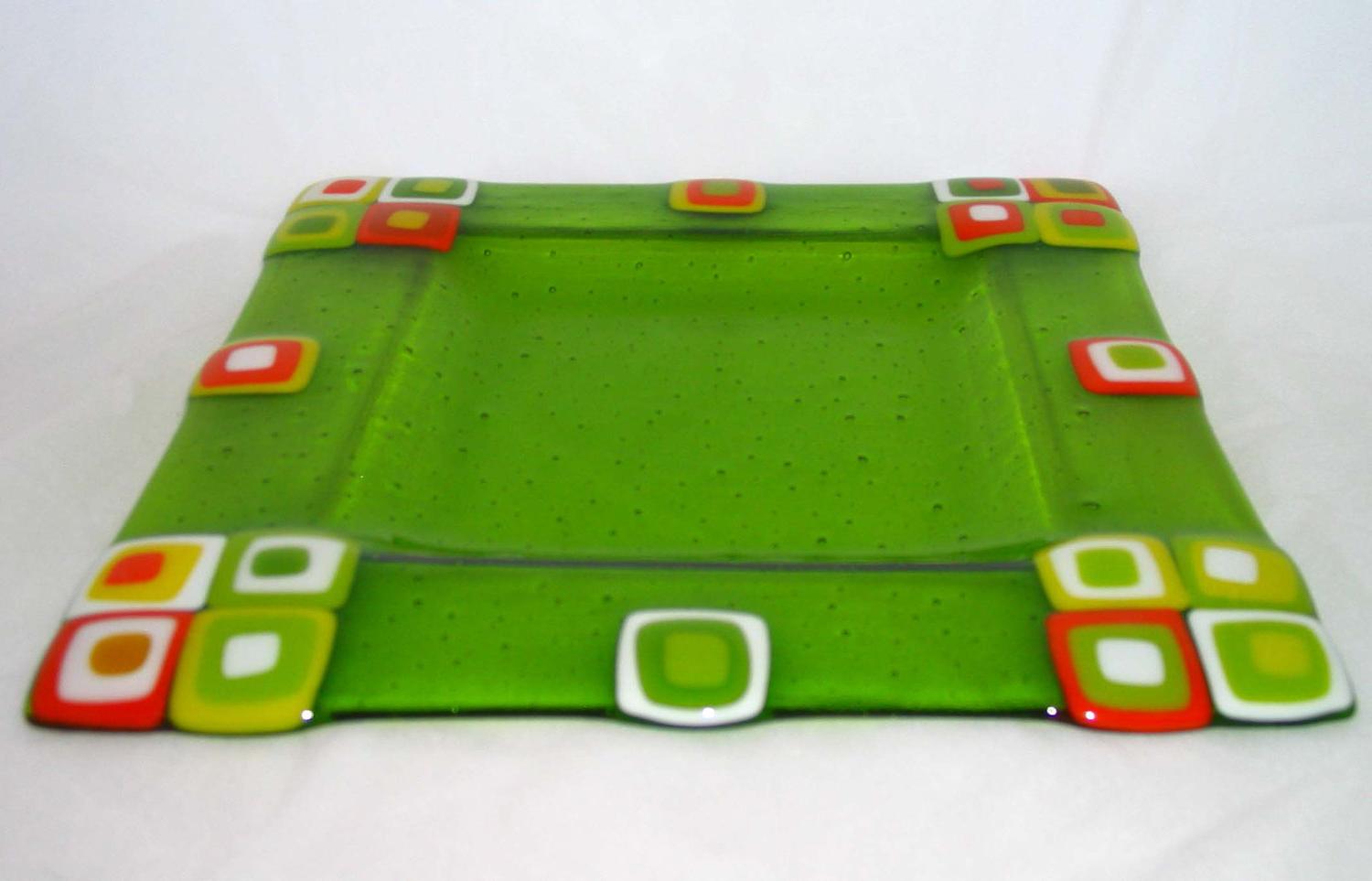 Fresh, spring green square plate platter with accents of orange, yellow,