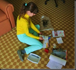 Cheryl checks out the loot.   Another CowBell!