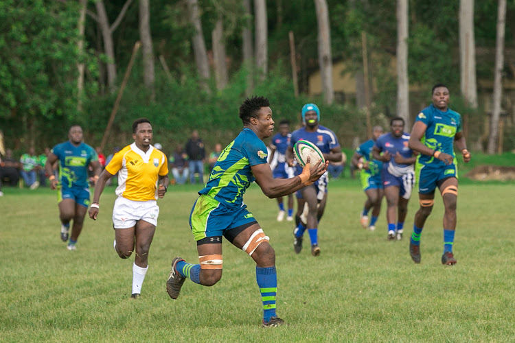 KCB’s Elvis Olukusi escapes a challenge from Strathmore Leos during a Kenya Cup match at the KCB Sports Club, Ruaraka on January 20.