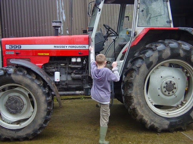 [child-climbing-into-tractor%255B5%255D.jpg]