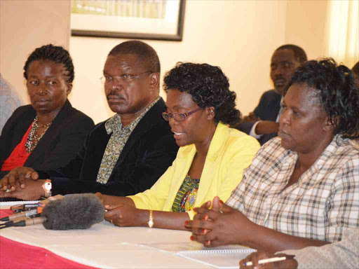 Kisii Health executive Sarah Omache (in yellow top) and her counterparts from LREB member counties address the press in Kisumu on Thursday /FAITH MATETE