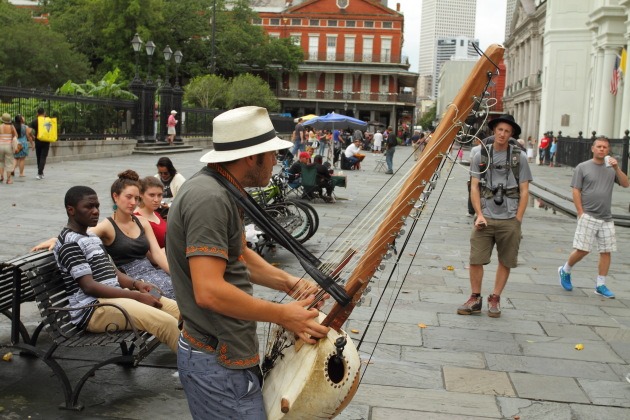 New Orleans Street Musician playing Kora African Base Harp