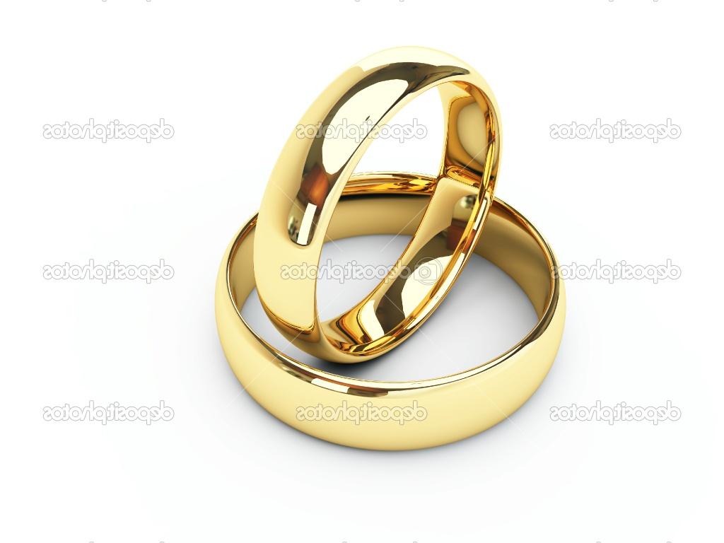 Gold wedding rings isolated white