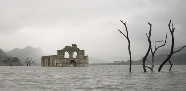 The colonial Temple of Quechula has resurfaced for a second time in the Nezahualcoyotl reservoir due to a drought, 19 October 2015. Photo: AP