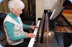 Audrey Hendon playing the grand piano. Photo courtesy of Dennis Lyons.