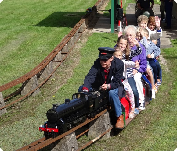 Visitors enjoy a miniature-gauge steam train ride