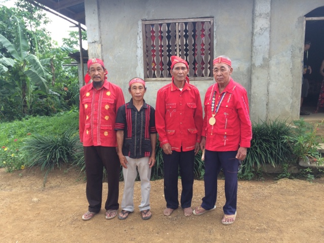 The Caballero brothers, dressed here in bright red embroidered traditional bukidnon shirts and headwear, are four of the most prominent chanters of the sugidanon.