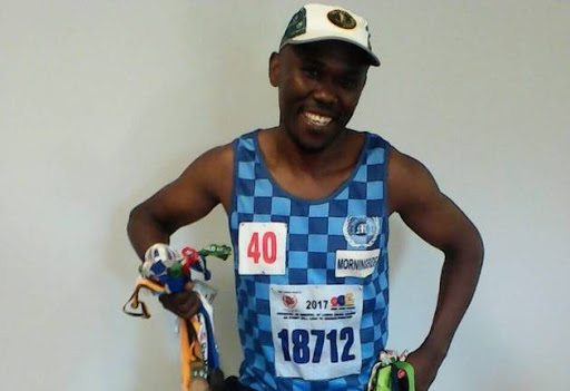 Luvuyo Stenge with some of his medals.