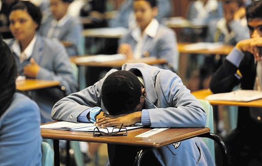 TIME UP: The final five minutes of the matric English exam at Gardens Commercial High School in Cape Town. Public transport delays made some pupils late for the exam