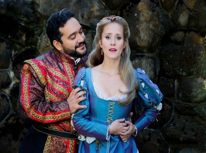 IN PERFORMANCE: Tenor RENÉ BARBERA as il Duca di Mantova (left) and soprano AMY MAPLES as Gilda (right) in Piedmont Opera's production of Giuseppe Verdi's RIGOLETTO, October 2015 [Photo © by Christina Holcomb Photography, LLC; used with permission]