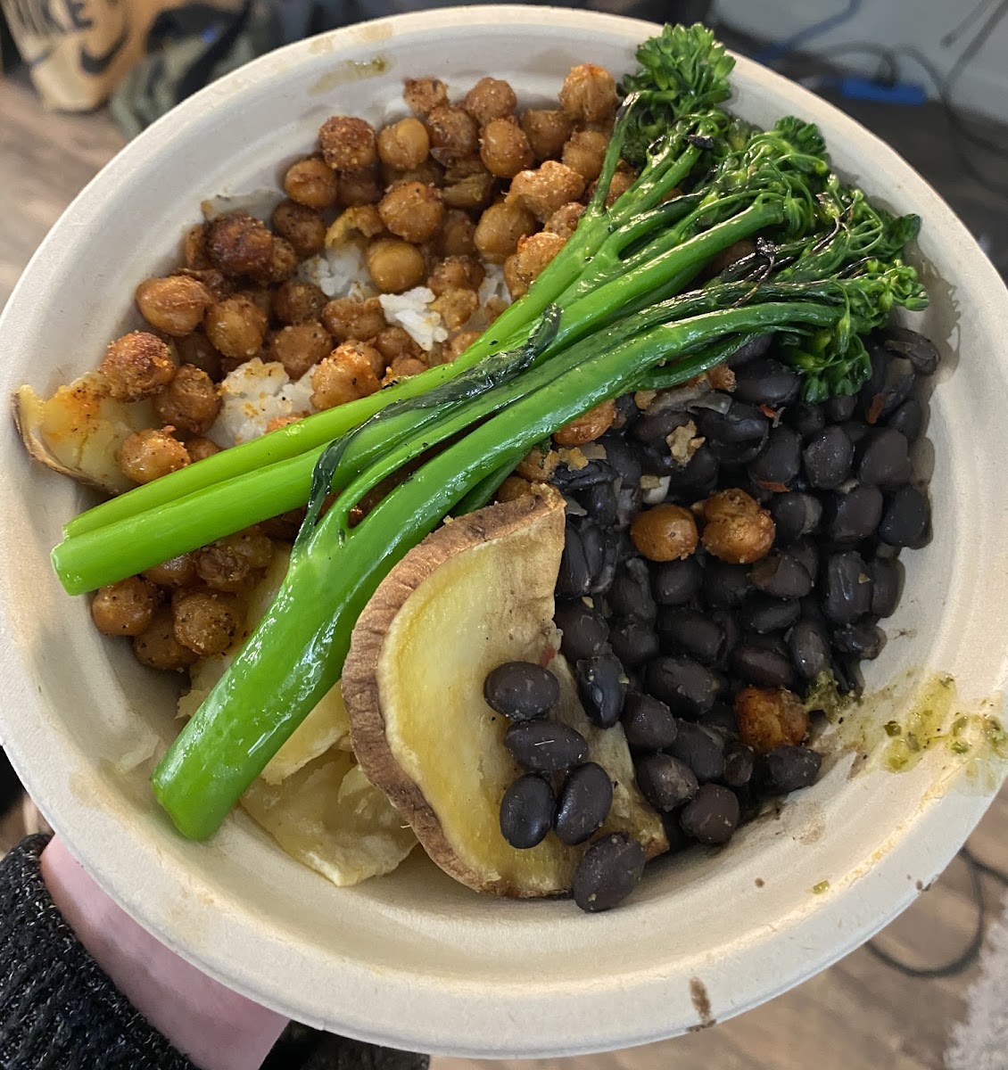 Make your own bowl: white rice, crispy chickpeas, roasted sweet potatoes, black beans, grilled broccolini, cilantro-lime pesto and tomatillo salsa on side