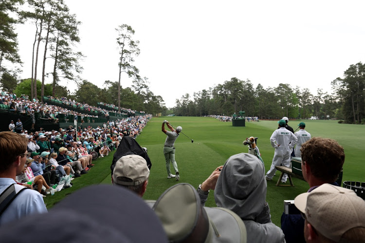 Northern Ireland's Rory McIlroy hits his tee shot on the 14th hole during a practice round for The Masters at Augusta National Golf Club in Augusta, Georgia on Tuesday.