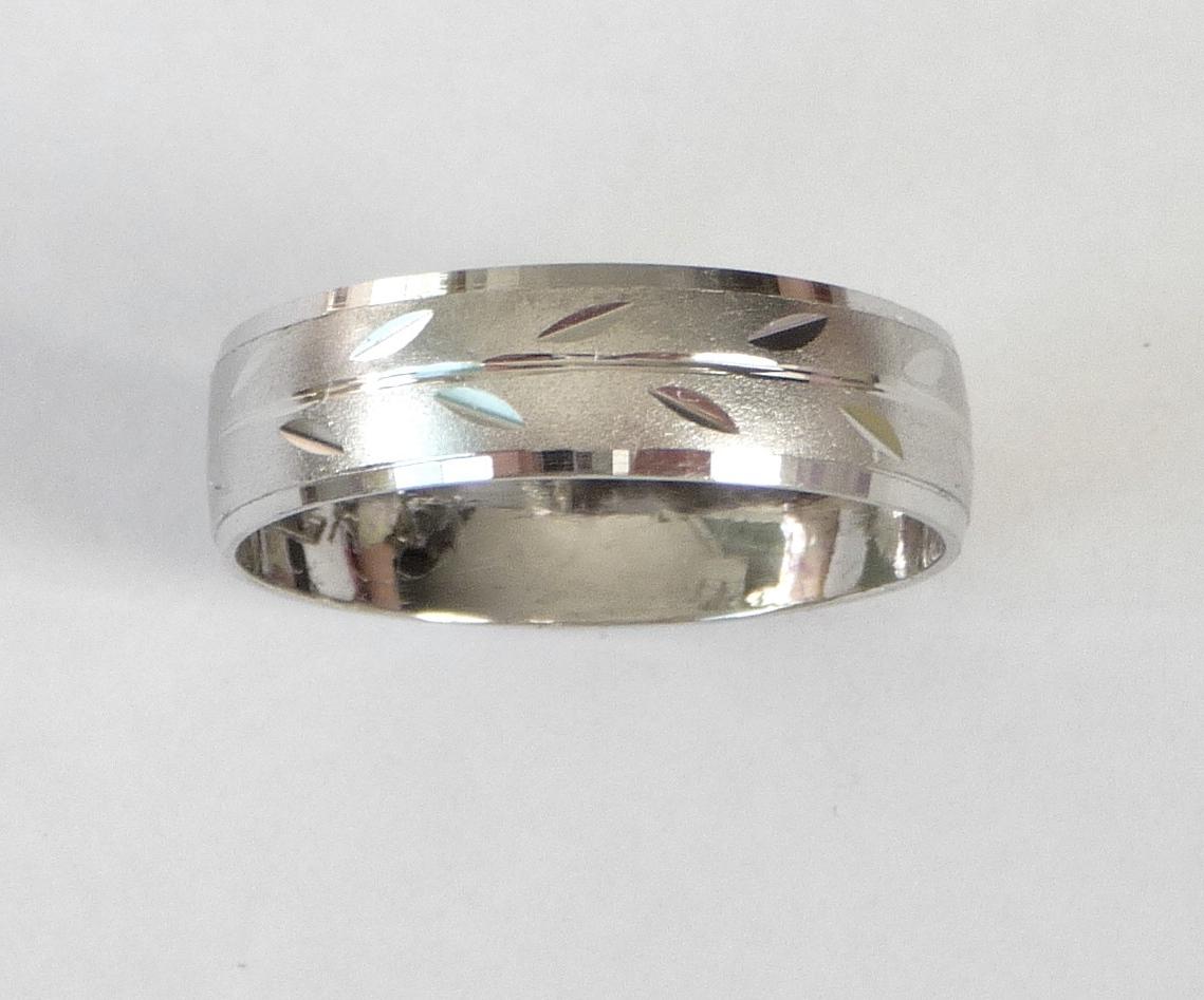 wedding band with leaves