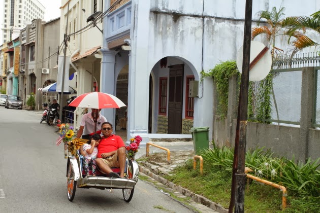 Tri Shaw on the streets of Georgetown, Penang, Malaysia
