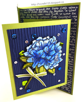 Linda Vich Creates: Best Thoughts Joy Fold Card. Shimmering sequins surround blossoms colored with Zig Clean Color Real Brush Markers on a woodgrain embossed panel of this Joy fold card.