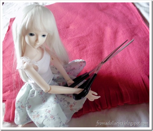 Ball Jointed Doll Posing with Scissors