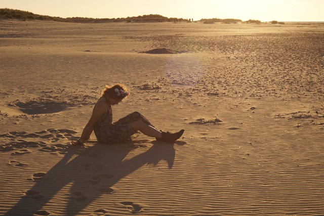 sheer dress on the beach at sunset