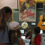 Lori, Hannah and Bryan looking at a display in the Country Music Hall of Fame in Nashville TN 09042011