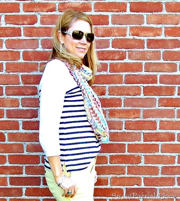 Yellow pants, navy striped shirt, multi colored scarf