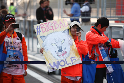 маршалы с плакатом BigBadWolf на Гран-при Кореи 2011