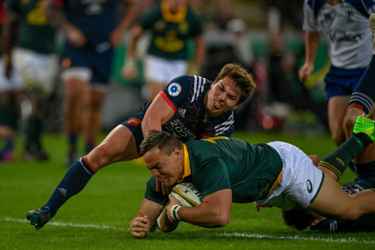 Springbok and Sharks tighthead prop Coenie Oosthuizen scores a try during the 2nd Castle Lager Incoming Series Test match between South Africa and France at Growthpoint Kings Park on June 17, 2017 in Durban, South Africa.
