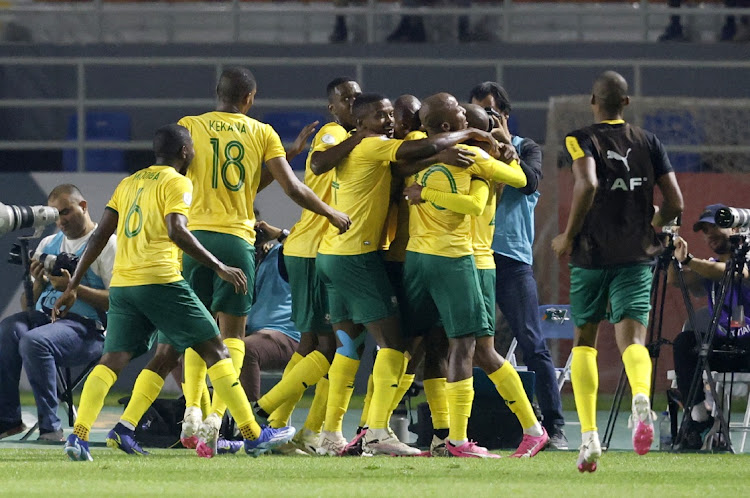 Bafana Bafana celebrate after Themba Zwane scores their second goal against Namibia at Stade Amadou Gon Coulibaly in Korhogo, Ivory Coast on Sunday