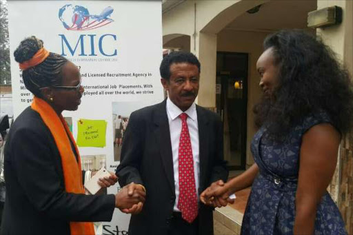 Eritrean ambassador Beyene Russom {n red tie} with Margaret Ikua{R} of Magtech Inspiration Centre and Jane Muigai director of toolkit Institute after signing a deal yesterday to recruit Kenyan lecturers to work in Eritrea