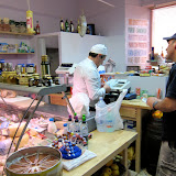 The cutest little deli man in the world.  Hilltop town - I think Overto?