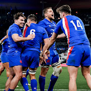 France rugby players celebrate after the match.
