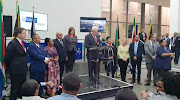 Western Cape premier Alan Winde with his new cabinet, from left, David Maynier, Ivan Meyer, Nomafrench Mbombo, Albert Fritz, Debbie Schafer, Bonginkosi Madikizela (concealed), Sharna Fernandez, Anroux Marais, Tertius Simmons, Anton Bredell and a sign-language interpreter.