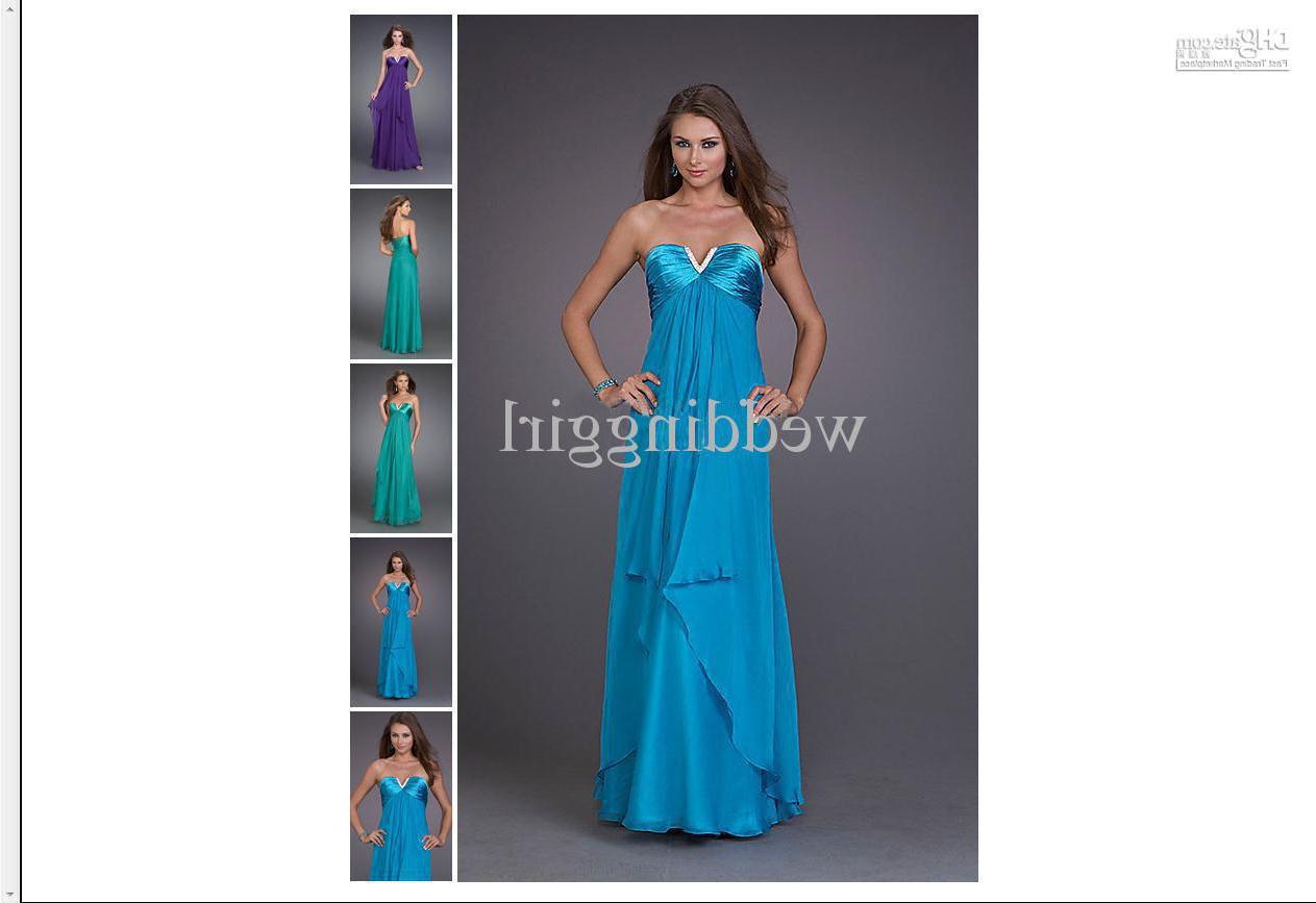 V-neck mermaid slhouette lace gown with satin bow and jeweled detail on