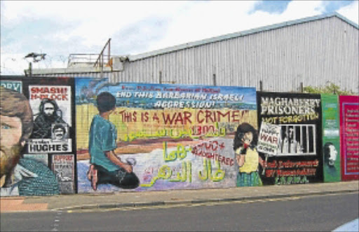 APARTHEID WALL: A mural in Belfast, Ireland, depicting a number of causes, among them Israeli apartheid.
