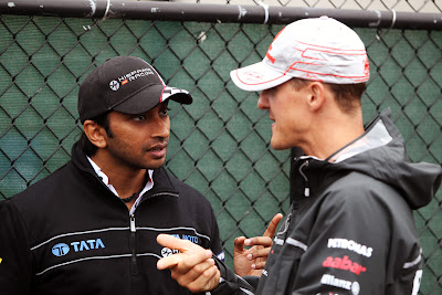 Нараин Картикеян и Михаэль Шумахер на Гран-при Канады 2011