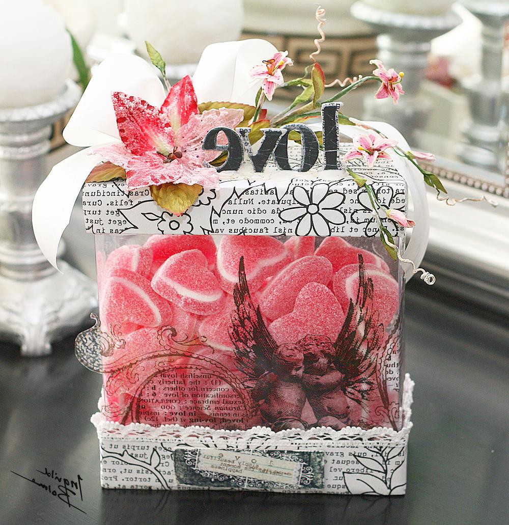 Two altered boxes with candy,