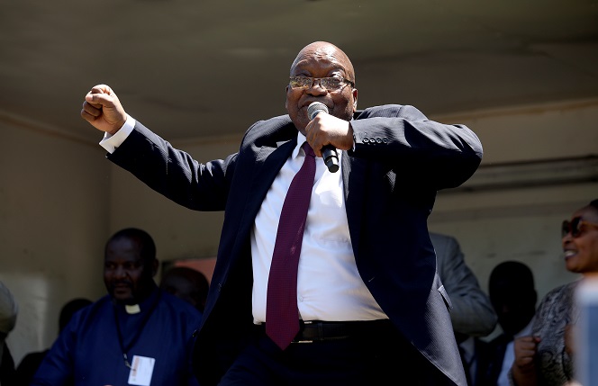 Former president Jacob Zuma addressed and entertained a small crowd of supporters outside the high court in Pietermaritzburg on Tuesday.